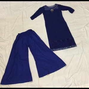 Top:straight cut Indian party dress in navy blue with sequin work.